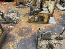 Load image into Gallery viewer, 60x44 inch gaming mat with a Ruined city Urban theme, marketed for tabletop gaming, a black canvas zipper bag included. A TableWar neoprene Tournament Tabletop warhammer Game Battle mat 
