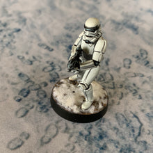 Load image into Gallery viewer, Clone foot prints in snow 6’x3’ gaming mat with a Snow Winter Planet theme, marketed for tabletop gaming, accompanied by a black canvas zipper bag TableWar neoprene Tournament Tabletop Game mat Star Wars: Legions
