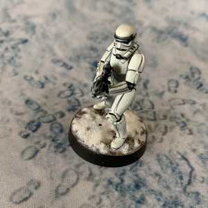 Clone foot prints in snow 6’x3’ gaming mat with a Snow Winter Planet theme, marketed for tabletop gaming, accompanied by a black canvas zipper bag TableWar neoprene Tournament Tabletop Game mat Star Wars: Legions